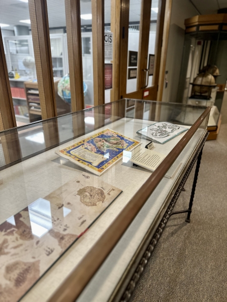 Maps in a glass case